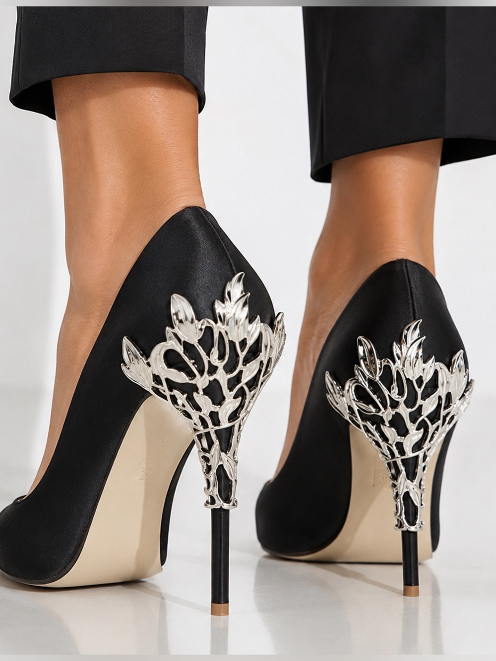 Elegant Black Pointed Stiletto Pumps with Silver Heel Detail